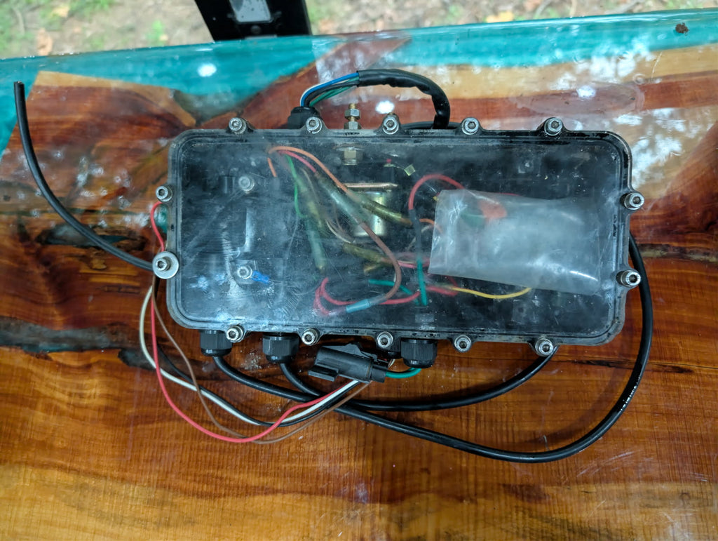 Krash 997 waterproof electrical control box top view showing clear lid, internal relay and wiring