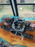 Kawasaki JS300 engine bottom end top view showing crankcase and connecting rod