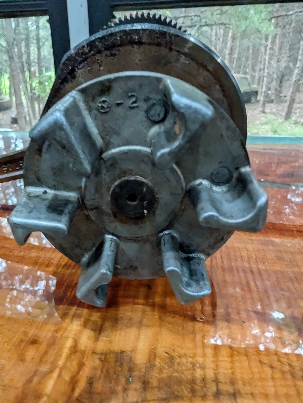 Kawasaki 750 flywheel end of crankshaft showing ring gear and casting marks