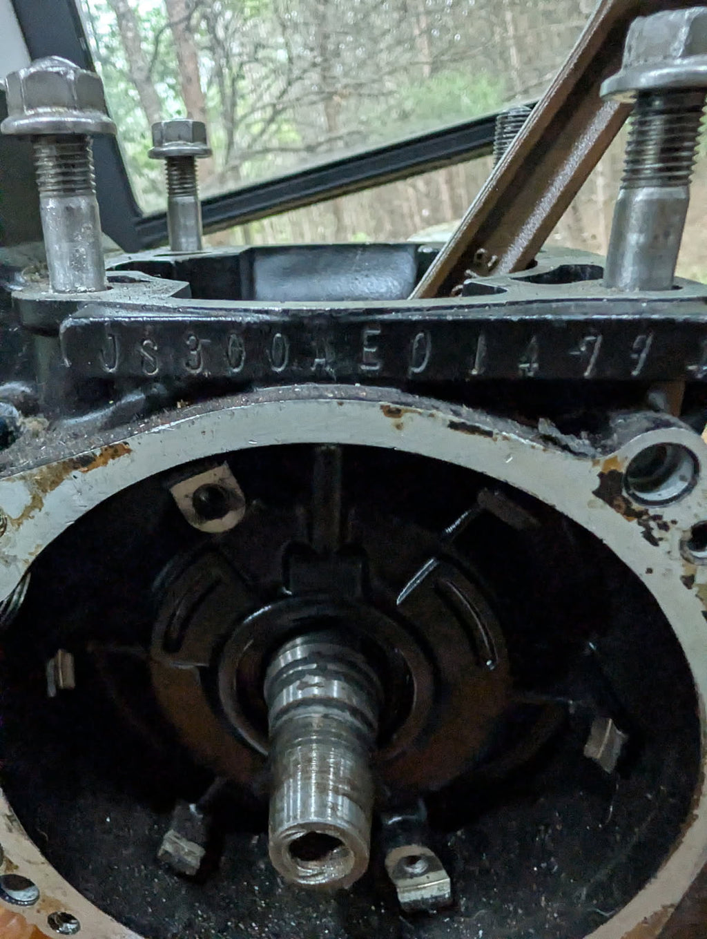 Kawasaki JS300 engine serial number KJS300AE01479 stamped on crankcase