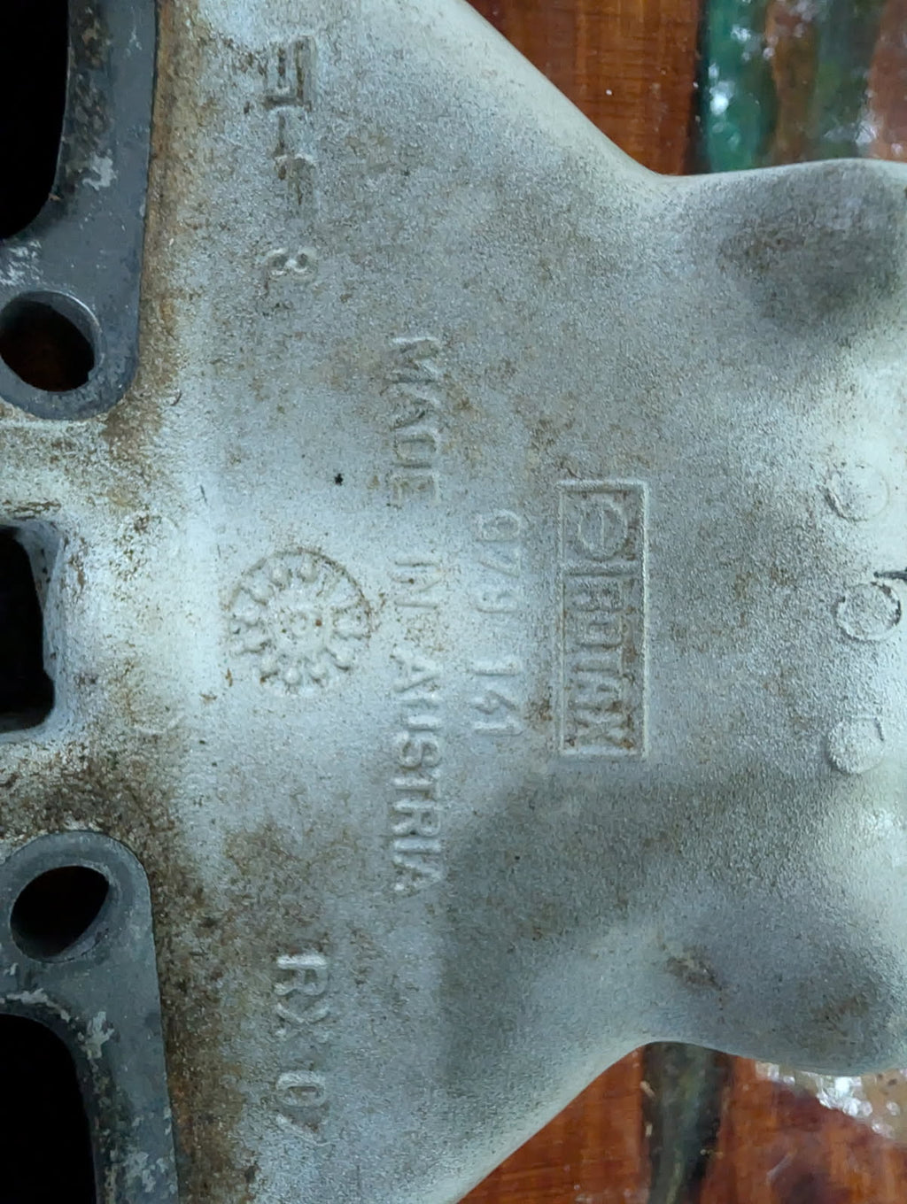Rotax casting stamp showing part number 970-141 Made in Austria
