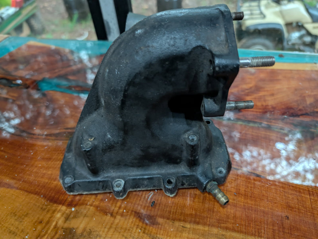 Kawasaki JS550 exhaust manifold reed block view